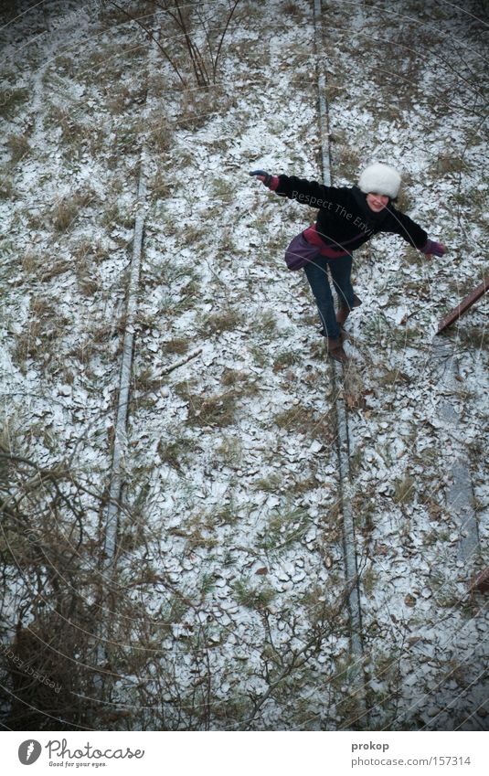 Flipside Boardslide Woman Contentment Acrobatics Railroad tracks Snow Winter Fur hat Meadow Grass Leaf Beautiful Attractive Cold Frost Joy