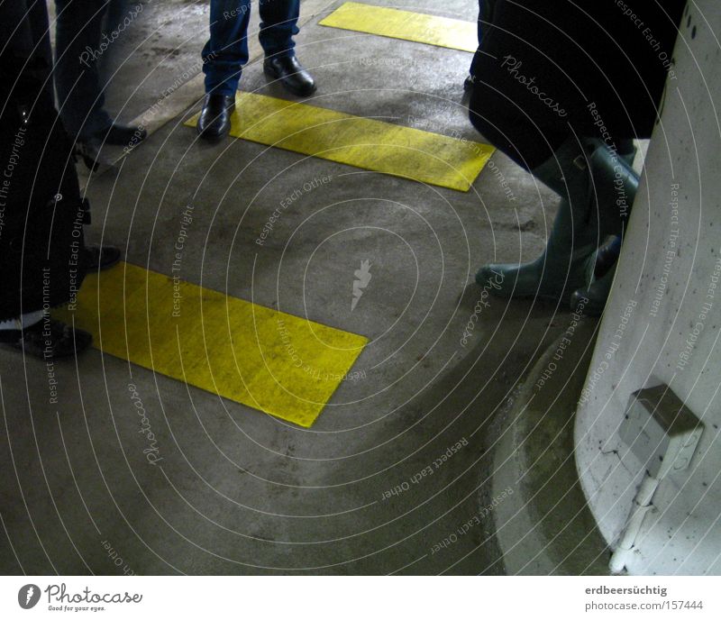 meeting Date Discussion Human being Dark Shadow Underground garage Gray Yellow Zebra crossing Communicate Group Feet Legs