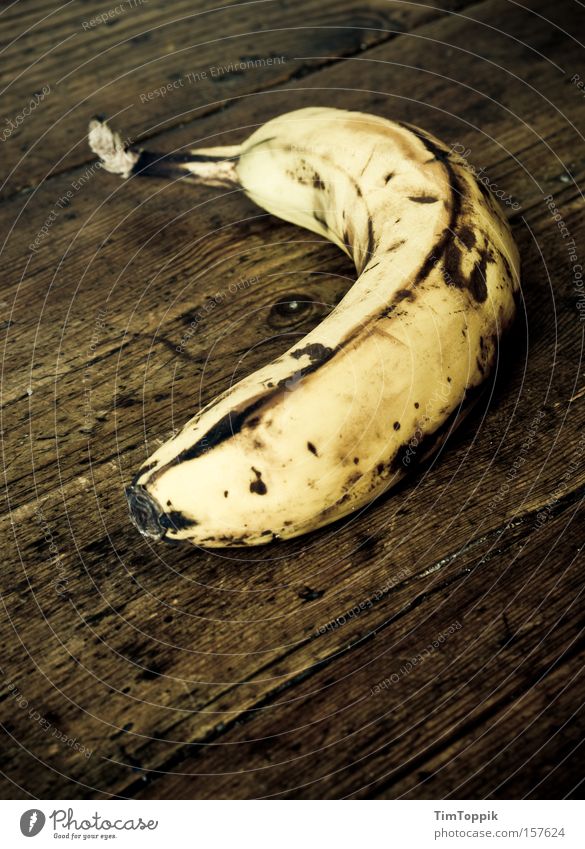The banana in and of itself Fruit Nutrition Banana Vitamin Sheath Table Wooden table Wood grain Still Life Kitchen Kitchen Table