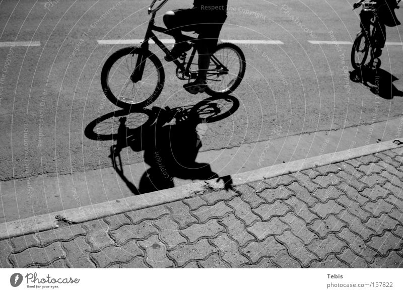 BMX kids Child BMX bike Shadow Black & white photo Street Wave Youth (Young adults) Bicycle