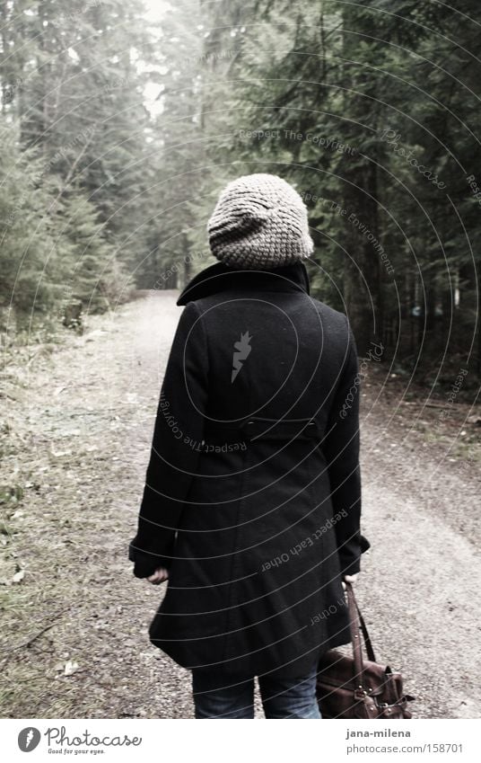 Grey cap in the forest Forest Lanes & trails Footpath Dark Bright Going Back Bag Coat Cap Loneliness Winter Woman Transience
