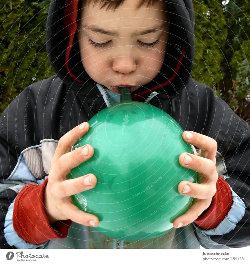 Until it bursts Boy (child) Child Infancy Balloon Blow Green Hooded (clothing) Effort Success Joy Juttas snail