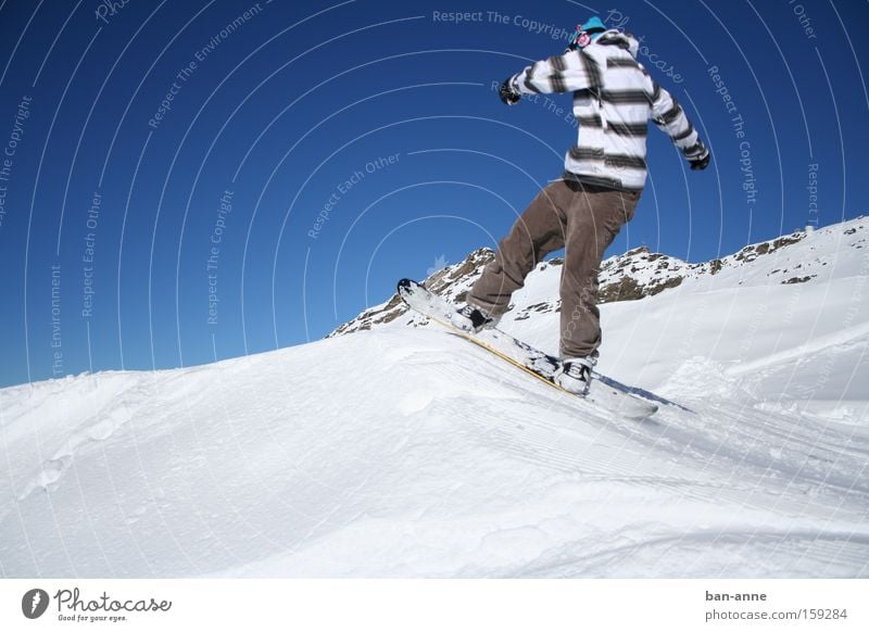 On the jump Snowboard Winter Jump Action Blue Sky Flying Sports Playing Winter sports Striped sweater Departure Snowboarding Snowboarder 1 Exterior shot