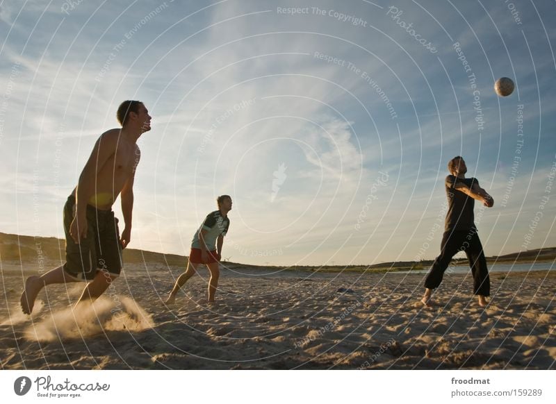 the ball is round Silhouette Sand Ball Sun Back-light Youth (Young adults) Cool (slang) Warmth Athletic Playing Sunset Volleyball (sport) Jump Man Barefoot