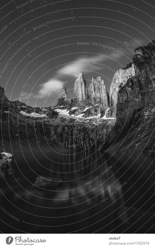Torres del Paine Clouds Stars Rock Mountain Peak Lakeside Gigantic Tall Idyll Calm Torrs del Paine Black & white photo Deserted Copy Space bottom