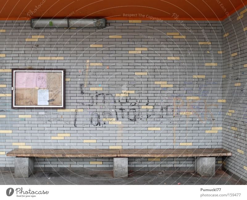 More beautiful waiting Shelter Loneliness Dirty Empty Tile Fluorescent Lights Graffiti Orange Gray Bus stop Wooden bench Architecture Mural painting Display
