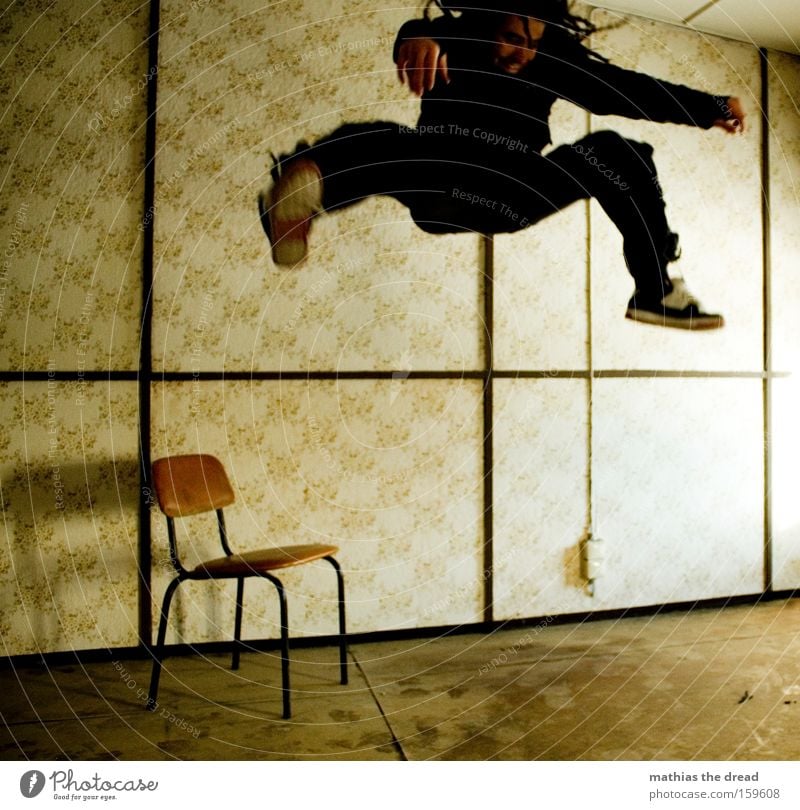 HANG TIME Man Jump Action Joy Dangerous Flying Fighter Room Window Sunlight Chair Wallpaper Line Whimsical Derelict Threat Aviation