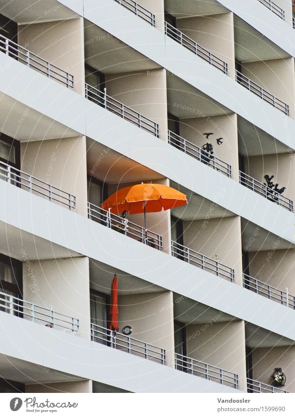 parasol Town House (Residential Structure) High-rise Architecture Hotel Facade Balcony Sunshade Orange Loneliness Uniqueness Identity Perspective