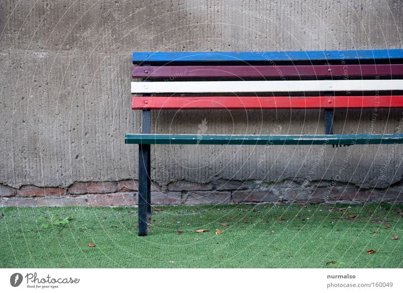 Colorful square Bench Park bench Multicoloured Colour Rainbow Artificial lawn Kindergarten Schoolyard Wall (building) Gray Converse Wall (barrier) Calm
