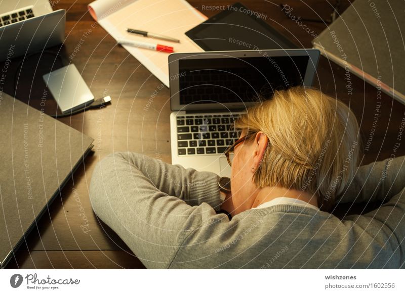 Woman sleeping on office desk Computer Notebook Keyboard Technology Adults 1 Human being 45 - 60 years Stationery File Relaxation Sleep Dream Blonde Broken