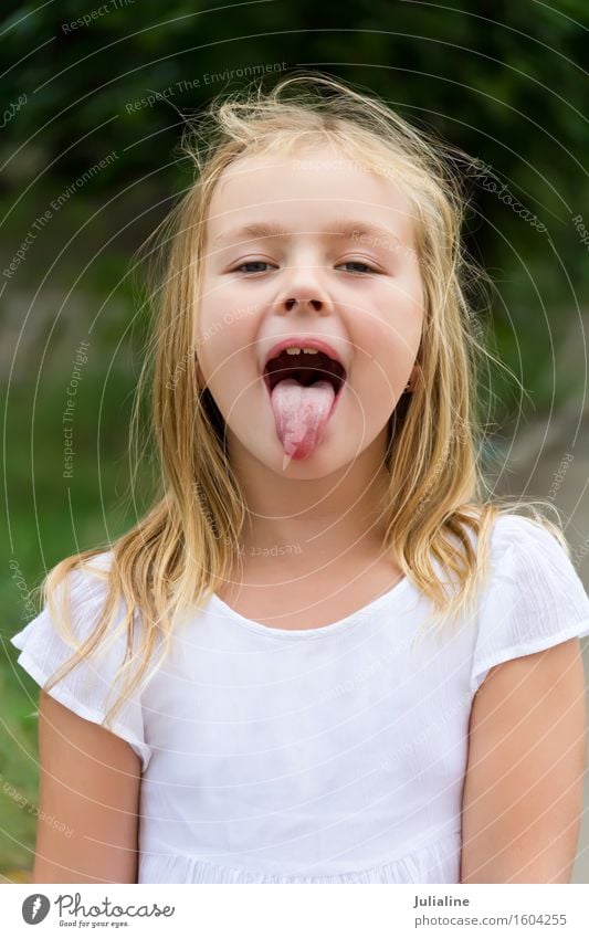 &#1057;ute girl with put out tongue Child Girl Infancy Mouth Human being 8 - 13 years Blonde Smiling Blue White kid Open preschooler younger schoolgirl five six