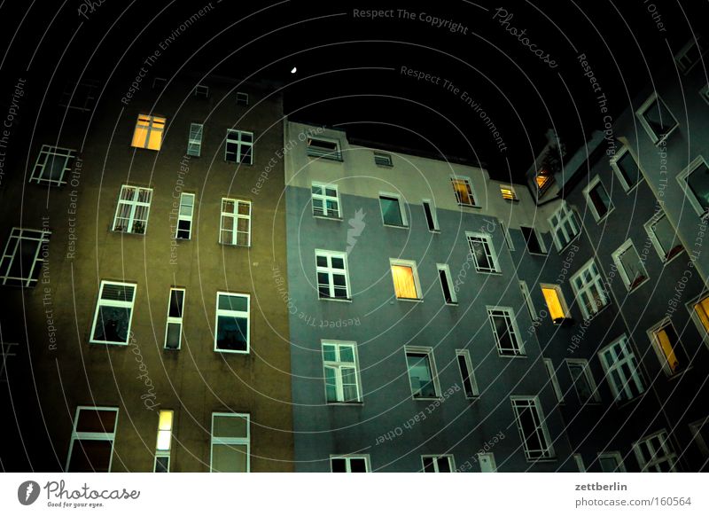 Lightened backyard Backyard House (Residential Structure) Town house (City: Block of flats) Tower block Apartment house Night Window Facade Flat (apartment)