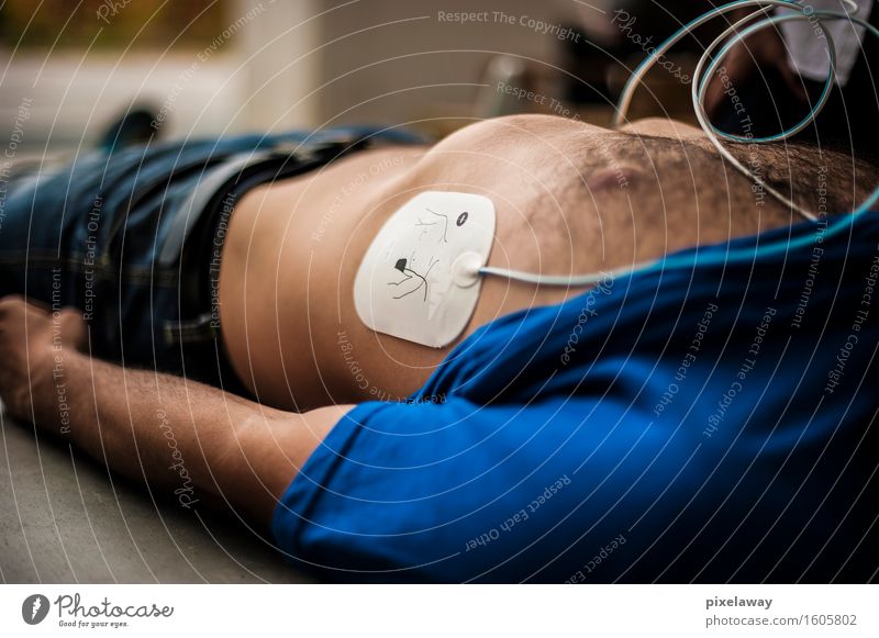 unconscious man with defibrillator pad Healthy Health care Medical treatment Human being 1 resuscitation cpr aed cardiopulmonar resuscitation cardiac massage