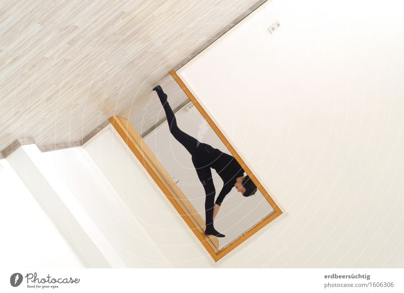 Downward jump in door frame - optical confusion due to rotation of the image Androgynous Woman Adults Wall (barrier) Wall (building) Sweater Tights Black-haired