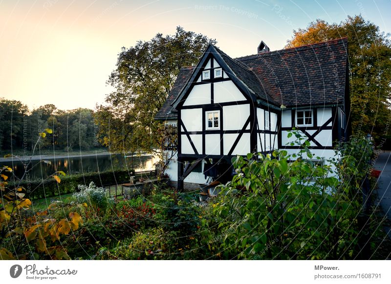 house on the lake Village Fishing village House (Residential Structure) Detached house Dream house Infancy Half-timbered house Lake River Elbe Evening sun