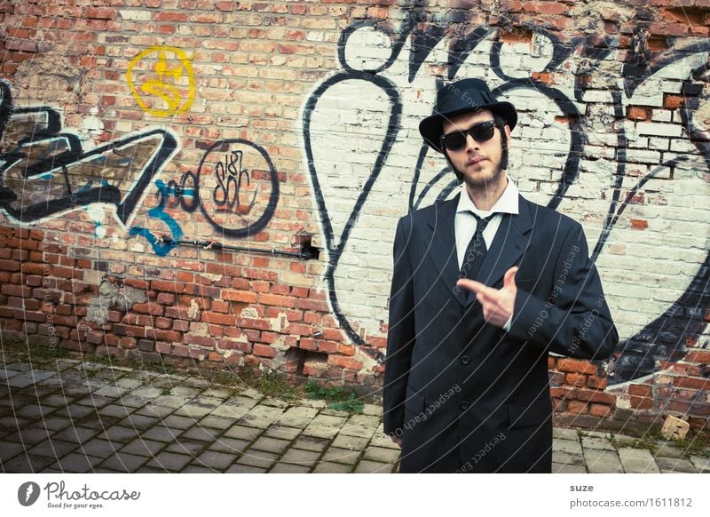 Mr. Bombastic. Music Carnival Business Human being Masculine Man Adults Friendship Actor Cinema Film industry Video Suit Sunglasses Hat Famousness Cool (slang)