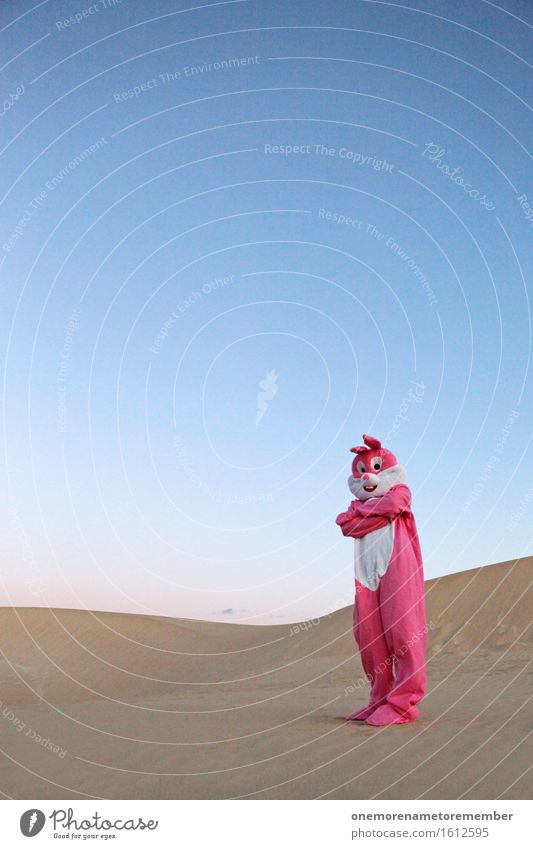 JO MAN! Art Work of art Esthetic Hare & Rabbit & Bunny Hare ears Desert Sand Sandy beach Pink Eye-catcher Blue sky Joy Absurdity Colour photo Multicoloured