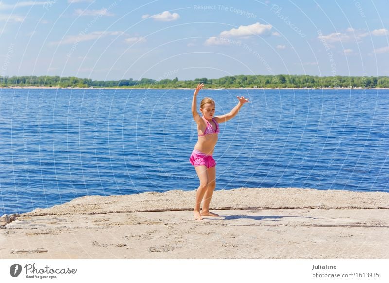 Dancing girl on the riverbank Joy Playing Summer Beach Ocean Child Schoolchild Girl Woman Adults Infancy 1 Human being 3 - 8 years 8 - 13 years Sand River bank