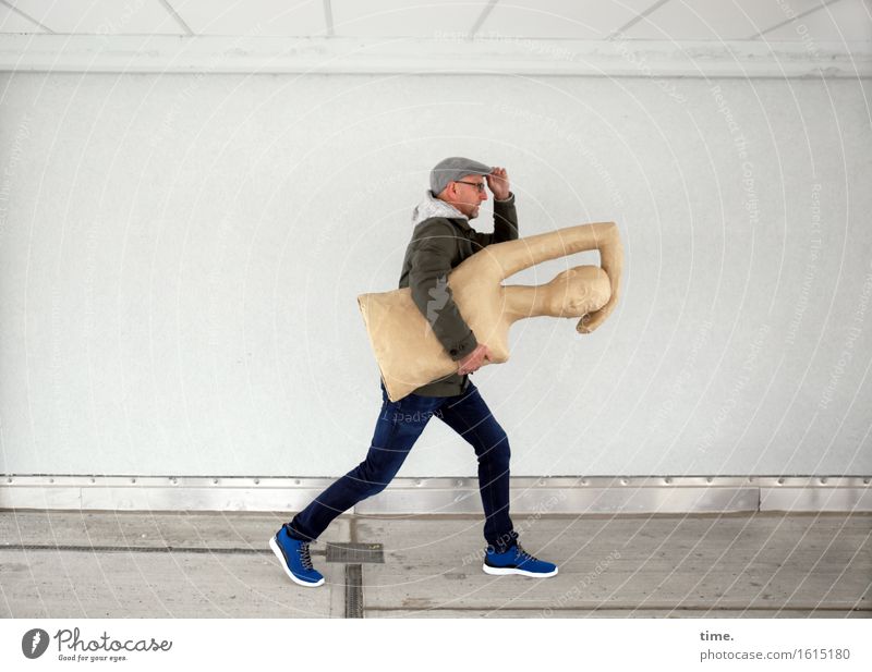 art to go Masculine 1 Human being Art Sculpture Wall (barrier) Wall (building) Jeans Jacket Cap Running To hold on Going Walking Carrying Exceptional Speed