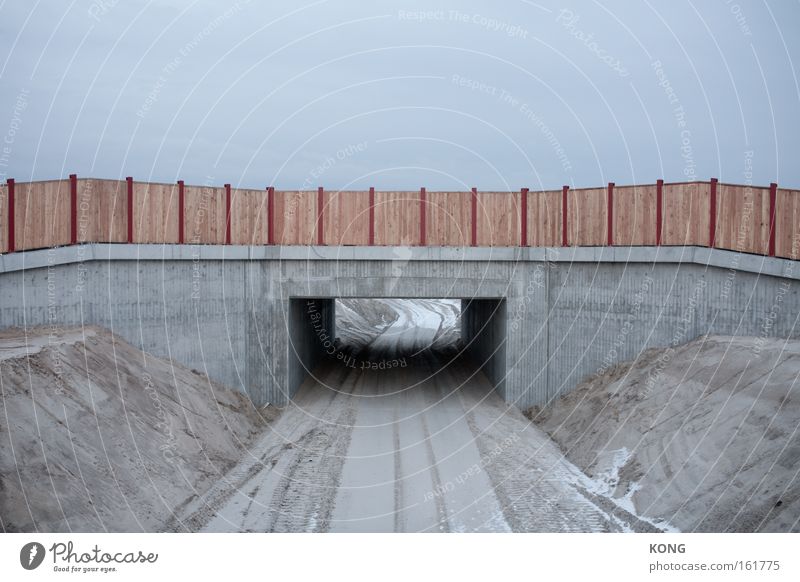 below the horizon it goes on Construction site Bridge Gray Dreary Concrete Cold Border Passage Breach Hollow Gloomy Colorless Badlands Incomplete Boredom Earth