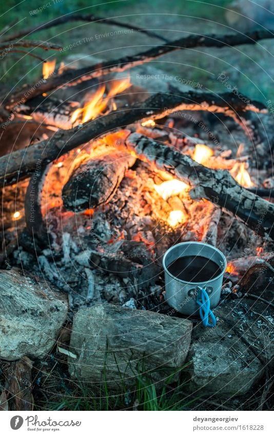 Making coffee on campfire in the forest Coffee Tea Pot Vacation & Travel Adventure Camping Summer Nature Forest Metal Steel Old Make Hot Natural Black Fireplace