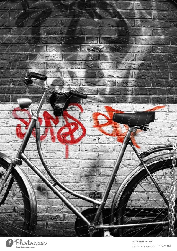Amsterdam cliche Bicycle Wall (barrier) Wall (building) Graffiti Movement Wheel Bicycle handlebars Handlebars Netherlands Chain Brick wall Black & white photo