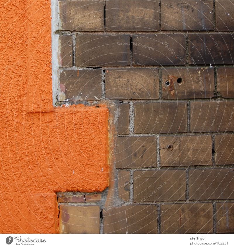 old and new. Manmade structures Building Wall (barrier) Wall (building) Facade Stone Brick Old Exceptional Sharp-edged New Town Brown Orange Brick facade