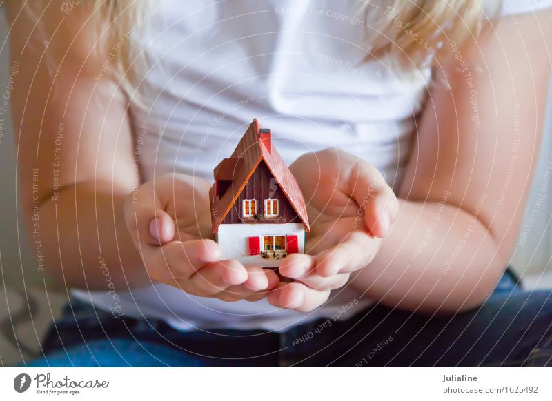 Dollhouse in human hand on white background Design House (Residential Structure) Business Human being Hand Architecture Small Idea dollhouse Home palm cottage