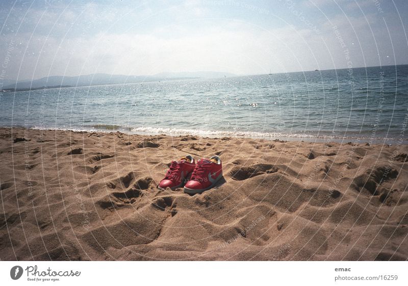 Shoes Footwear Beach Cannes Ocean Red Leisure and hobbies Water Sky Sand