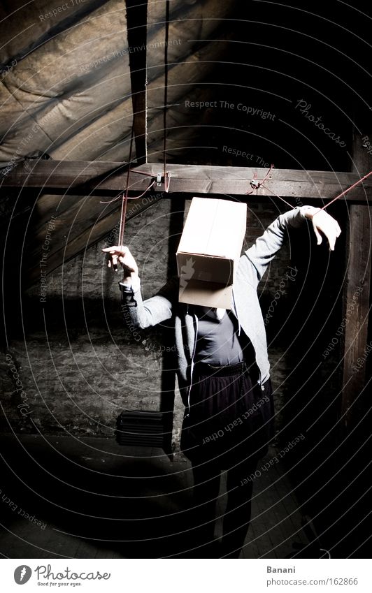 In the ropes Disorientated Loneliness Cardboard Attic Discern Sadness Rope Dark Stage lighting Interior shot