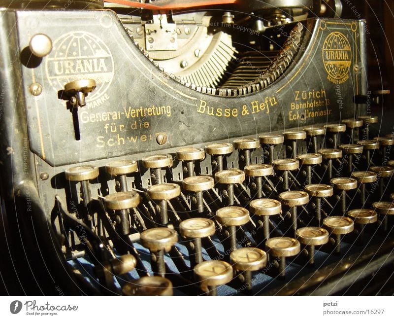 Beautiful old thing Keyboard Old Write Typewriter Ancient Antique Urainia from Zurich ink ribbon Colour photo Interior shot Deserted Artificial light