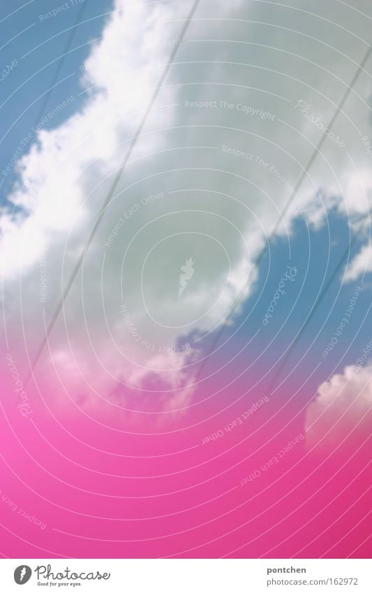 Power lines in front of a blue sky with a blurred pink surface. Electricity. Summer Sky Clouds Warmth Above Pink Energy electricity High voltage power line