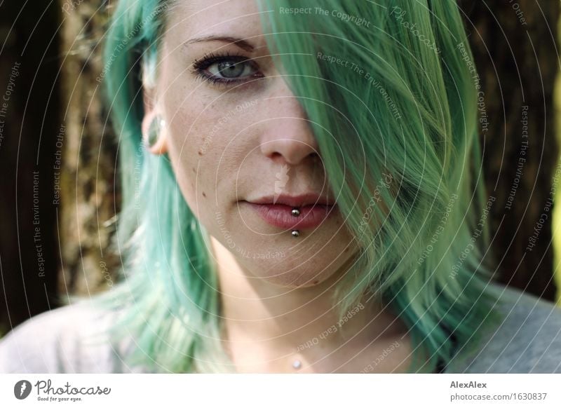 portait Face Life Young woman Youth (Young adults) Hair and hairstyles 18 - 30 years Adults Tree Piercing Turquoise Hair colour Observe Looking Esthetic
