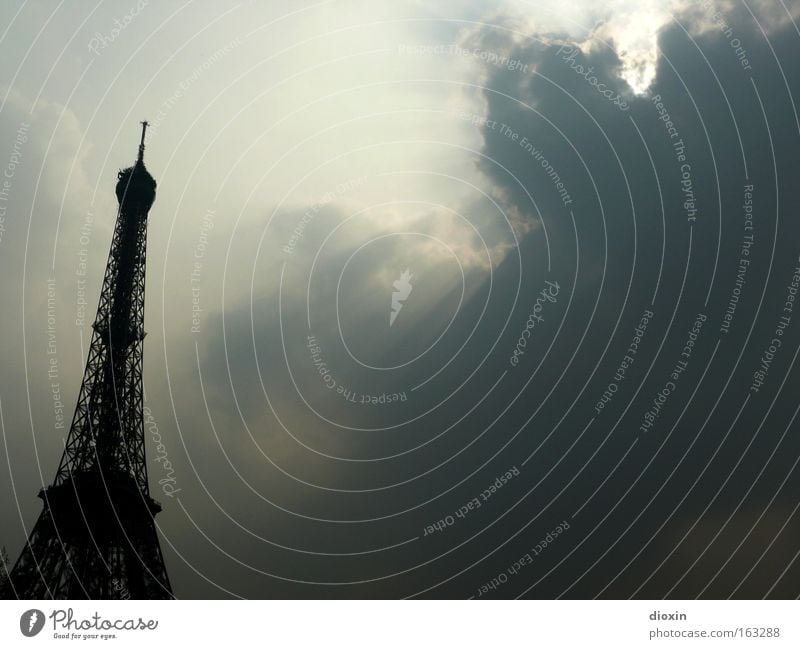 au revoir, Paris! Eiffel Tower Steel Half-timbered facade Back-light Architecture Monumental Tall Massive Transmitting station Iron Tourism Clouds Sun Historic