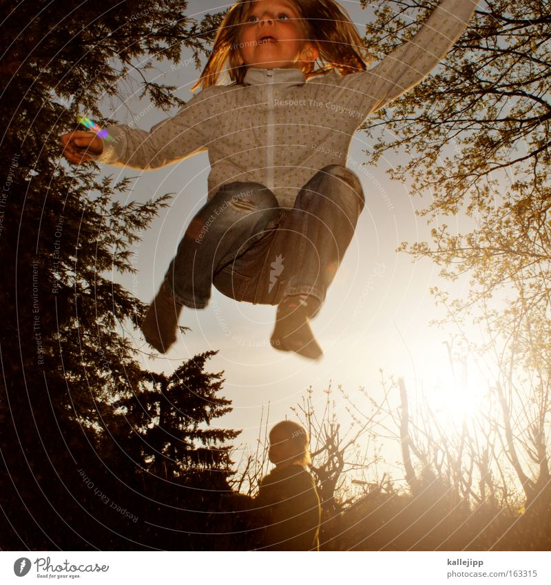spring-time Child Girl Jump Playing Trampoline Garden Nature Human being Tree Back-light Joy Movement Leisure and hobbies