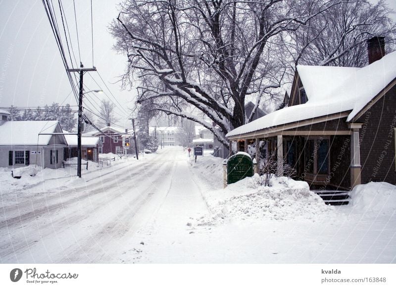 Snowy road Subdued colour Exterior shot Deserted Day Central perspective Winter USA Americas Village Small Town Outskirts House (Residential Structure)