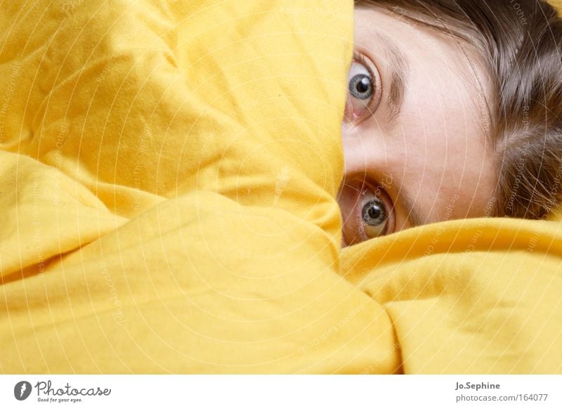 You got me! Young woman Woman Adults Face eyes Duvet Looking pretty Curiosity Cute Yellow Protection Safety (feeling of) Fatigue Morning grouchiness Timidity