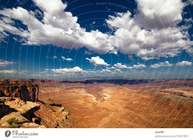 Canyonlands Vacation & Travel Tourism Adventure Freedom Summer vacation Hiking Landscape Sand Sky Clouds Rock Canyonlands National Park Blue Multicoloured