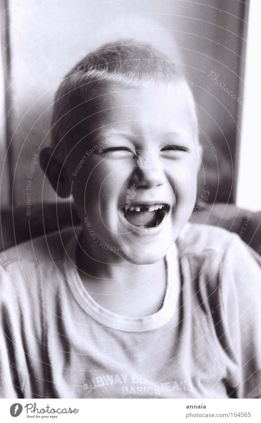 Toothless Laugh Black & white photo Interior shot Day Portrait photograph Upper body Looking Looking into the camera Masculine Child Boy (child) Face Mouth