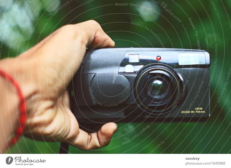 analog camrea Lifestyle Style Design Leisure and hobbies Camera Technology Plastic Utilize Touch To hold on Playing Old Retro Black Hand Fingers Vintage Analog