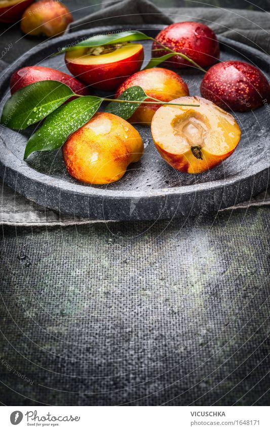 Fresh peaches with green leaves on stone slab Food Fruit Dessert Nutrition Organic produce Vegetarian diet Diet Juice Plate Style Design Healthy Eating Life