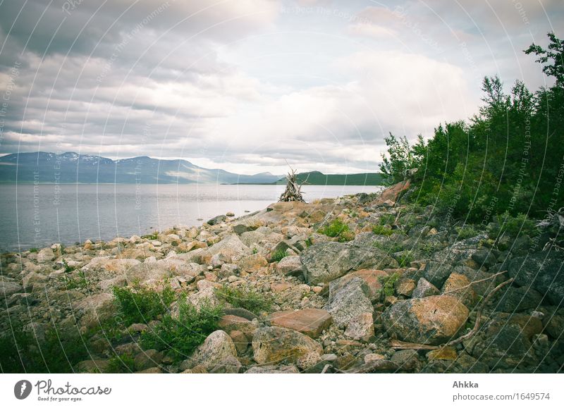 Wood fire and stone beach Healthy Harmonious Senses Relaxation Calm Adventure Landscape Clouds Mountain Lakeside Stone Moody Colour photo Exterior shot Deserted