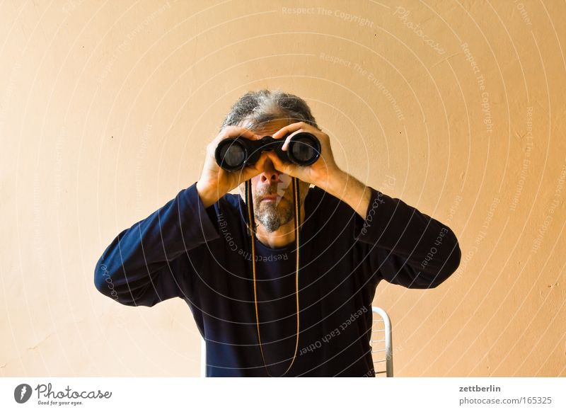 search Binoculars Telescope Search Perspective Opinion Far-off places Vantage point search function Man Senior citizen Old Sit Seating Chair Observe Looking