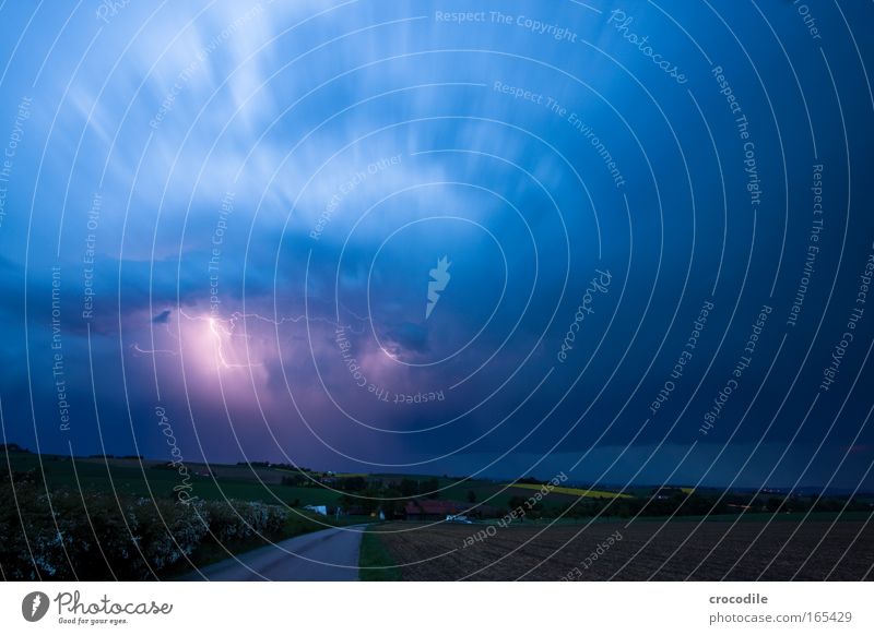 thunderstorms Colour photo Exterior shot Deserted Copy Space right Copy Space top Twilight Night Contrast Motion blur Deep depth of field Central perspective