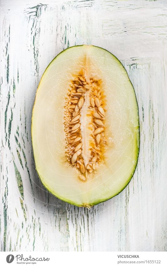 Half the melon with seeds Food Fruit Dessert Nutrition Organic produce Vegetarian diet Diet Style Healthy Eating Life Summer Table Yellow Design Honeydew Seed