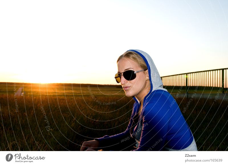 sunshine Colour photo Exterior shot Looking away Feminine 1 Human being 18 - 30 years Youth (Young adults) Adults Landscape Sunrise Sunset Bridge Sunglasses