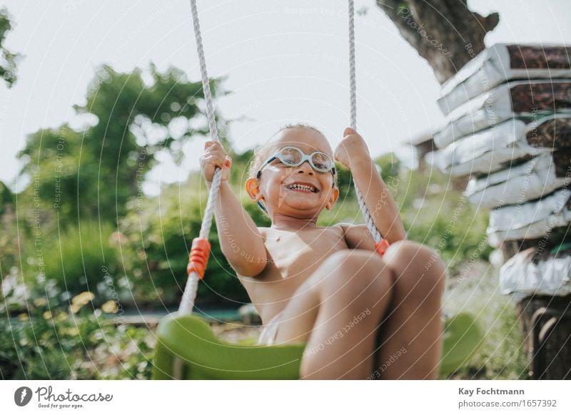 ° Life Contentment Playing Swing Freedom Summer Garden Human being Toddler Boy (child) Infancy 1 1 - 3 years Eyeglasses Movement Laughter To swing Illuminate
