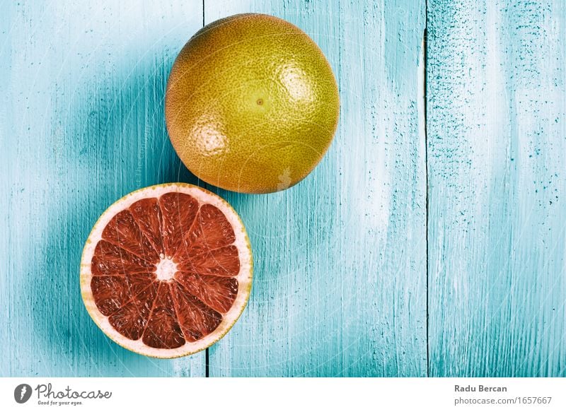 Fresh Red Oranges On Wood Table Food Fruit Nutrition Eating Organic produce Vegetarian diet Diet Healthy Healthy Eating Nature Summer To feed Simple Round Sweet