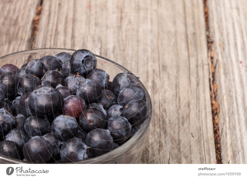 Clear glass bowl of ripe blueberries Food Fruit Nutrition Eating Breakfast Picnic Organic produce Vegetarian diet Diet Bowl Plant Blue Colour photo Morning Dawn