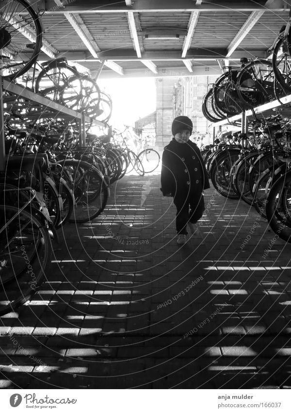 Bicycle Shed Black & white photo Morning Light Shadow Contrast Silhouette Forward Human being Child Boy (child) Infancy 1 1 - 3 years Toddler Environment